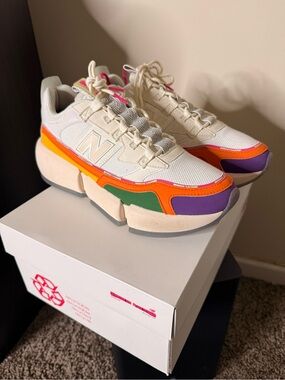 Vision Racers New Balance Cream Sneakers with Orange, Purple & Green Accents